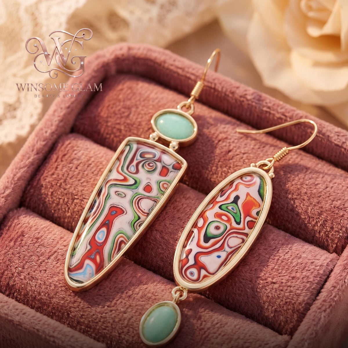 Gold leaf drop earrings worn